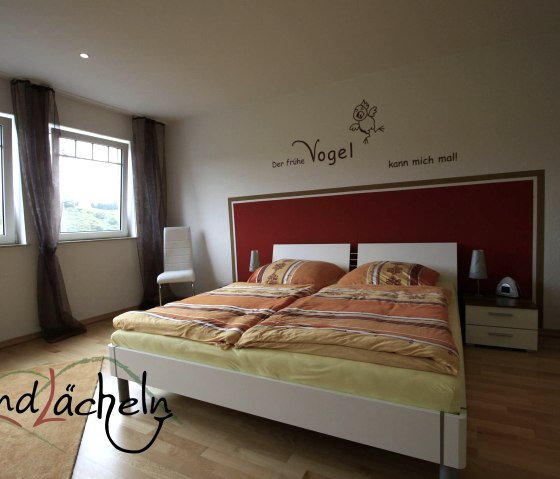 Das ,rote' Schlafzimmer, © Familie Floßdorf Das ,rote' Schlafzimmer, © Familie Floßdorf