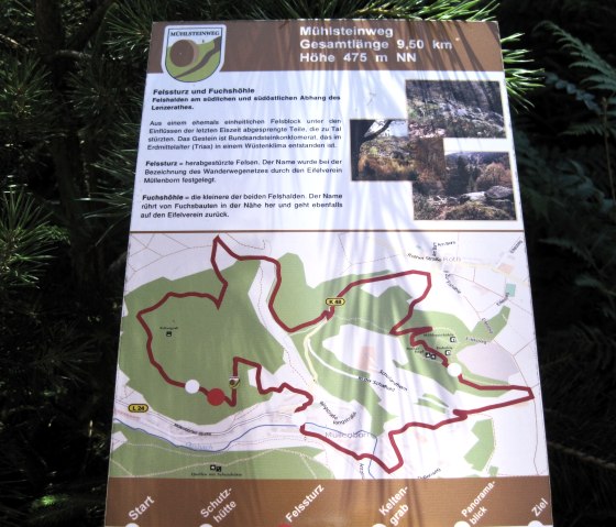 Millstone Trail information board with map and information about the route. Total length 9.50 km, altitude 475 m above sea level. Contains pictures and text about the rockslide and fox cave., © Touristik GmbH Gerolsteiner Land, Ute Klinkhammer Millstone Trail information board with map and information about the route. Total length 9.50 km, altitude 475 m above sea level. Contains pictures and text about the rockslide and fox cave., © Touristik GmbH Gerolsteiner Land, Ute Klinkhammer
