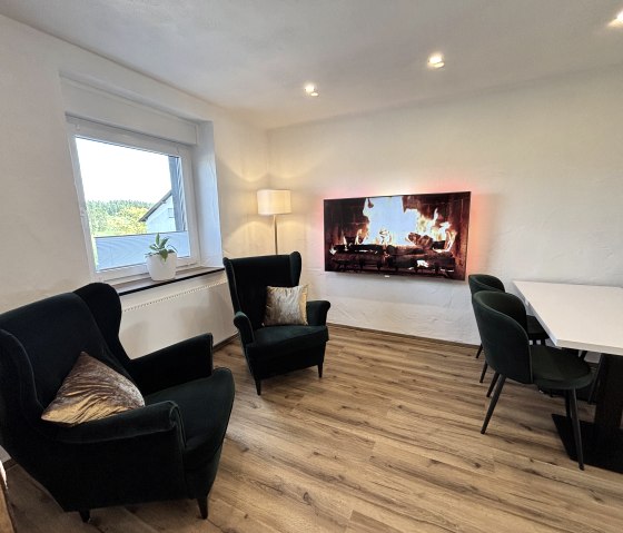 Lounge + Frühstücksraum Lounge + Frühstücksraum