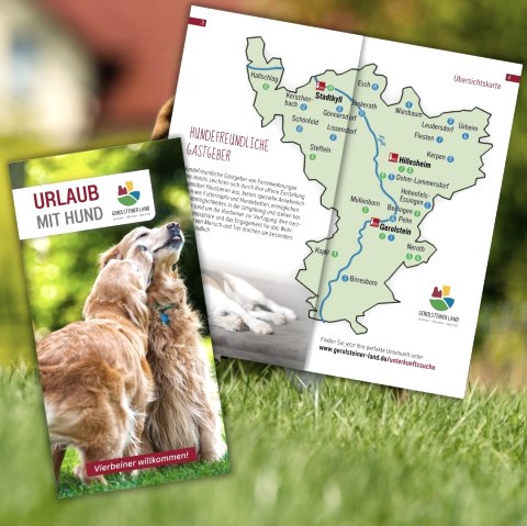 Cover page of the brochure ‘Holidays with your dog’ with overview map open., © Touristik GmbH Gerolsteiner Land Cover page of the brochure ‘Holidays with your dog’ with pages open showing an overview map of the region.