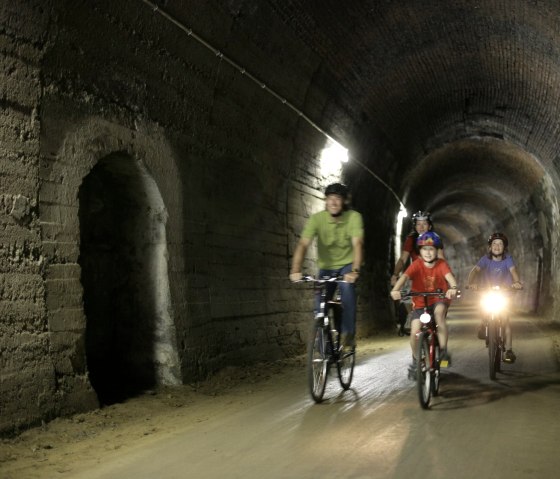 The tunnel passage near Bleialf makes it clear: the Eifel-Ardennes Cycle Route was originally a railroad line, © Eifel Tourismus GmbH/intention The tunnel passage near Bleialf makes it clear: the Eifel-Ardennes Cycle Route was originally a railroad line, © Eifel Tourismus GmbH/intention