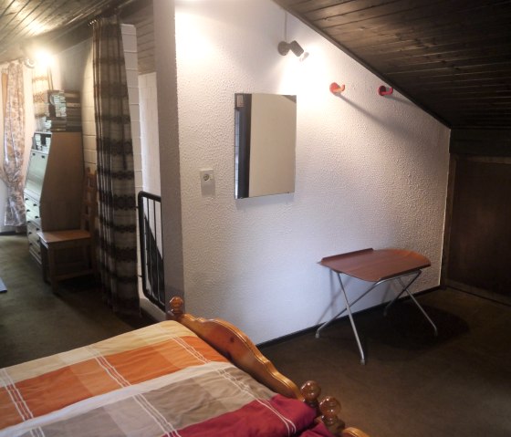 Ferienhaus Ammermann Schlafzimmer OG 1.1, © Touristik GmbH Gerolsteiner Land > A. Kube Ferienhaus Ammermann Schlafzimmer OG 1.1, © Touristik GmbH Gerolsteiner Land > A. Kube