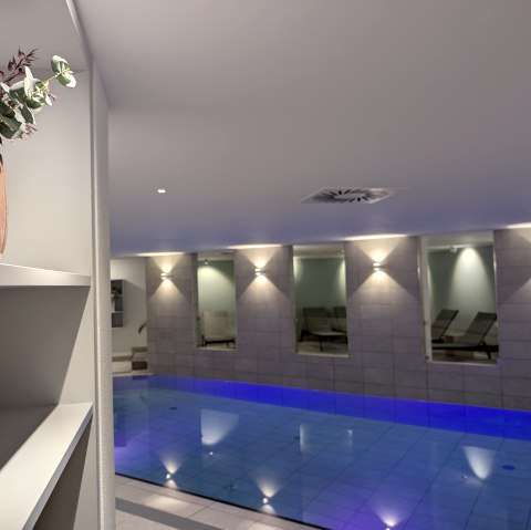 Indoor-Pool im Spabereich des Augustiner Hotel Hillesheim
, © Augustiner Hotel Ein Indoor-Pool mit blauem Wasser in einem warm beleuchteten Spa-Raum.