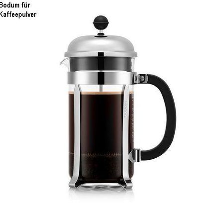 Eine stilvolle French Press zur Zubereitung von Kaffee. Sie hat ein elegantes Design mit einem schwarzen Griff und einem metallischen Deckel.