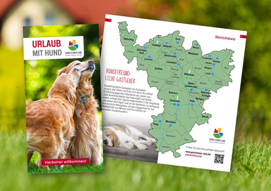 Titelseite der Broschüre "Urlaub mit Hund" und aufgeschlagene Seiten mit Kartenübersicht der Ferienregion Gerolsteiner Land.