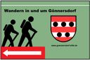 Schild mit Wanderern, Wappen und Website von Gönnersdorf.