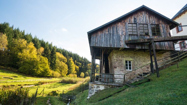 Old cutting mill near Meisburg in an autumnal landscape.