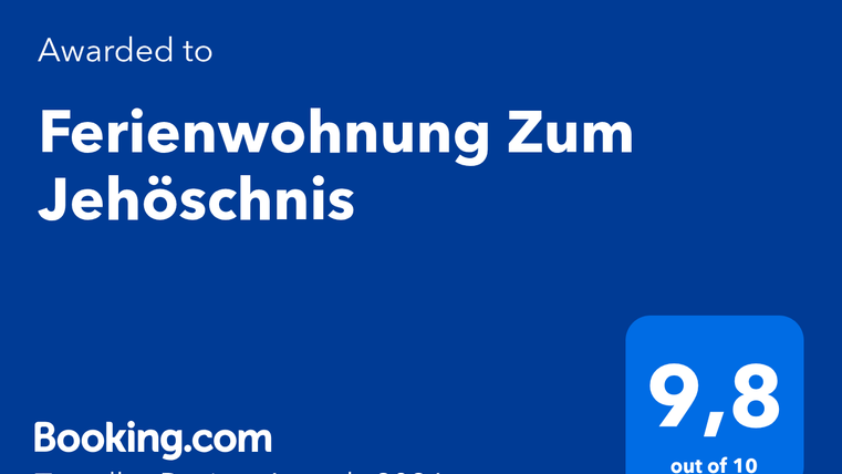An award for the vacation apartment Zum Jehöschnis. The accommodation has a rating of 9.8 out of 10 at the Traveller Review Awards 2026.