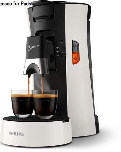 Eine Kaffeemaschine von Philips mit zwei Tassen frisch gebrühtem Kaffee. Sie ist in Schwarz und Weiß mit einem modernen Design.