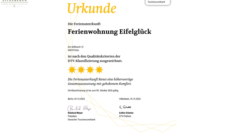 A certificate for the vacation apartment Eifeglück, awarded four stars. The award confirms the high quality and comfort of the accommodation.