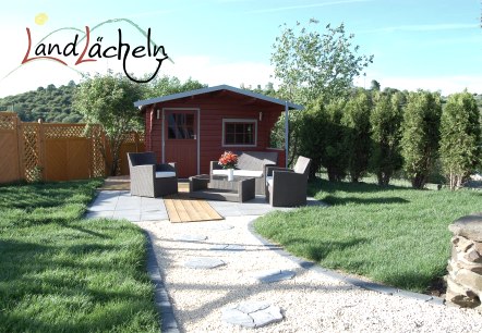 Die zweite (Sonnen-)Terrasse mit Lounge-Möbeln, © Familie Floßdorf