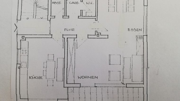 A digital floor plan of a house. The rooms include kitchen, living, dining, and terrace.
