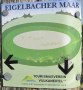 Schild mit 'Eigelbacher Maar', zeigt eine schematische Darstellung eines Maars. Unten steht 'Tourismusverein Vulkaneifel e.V.' mit Pfeilen., © Touristik GmbH Gerolsteiner Land