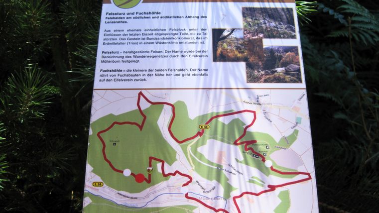 Panneau d'information du sentier des meules avec carte et informations sur l'itinéraire.